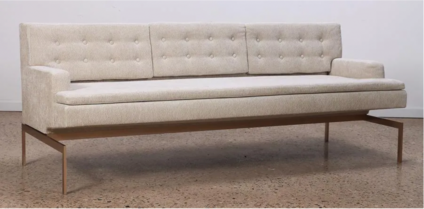 A "Mancini" upholstered sofa