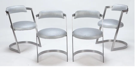 Four steel and faux ostrich chairs